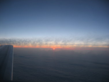 zonsopgang boven de wolken